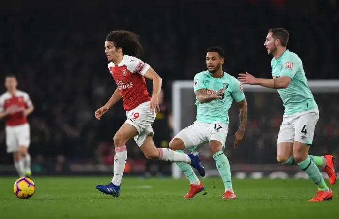Framed Print : Guendouzi's Tense Triangle: A Clash with Gosling and King during Arsenal vs. Bournemouth