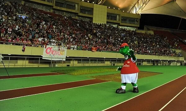 Gunnersaurus in Action: Arsenal's Mascot at 2011 Pre-Season Match in Hangzhou, China
