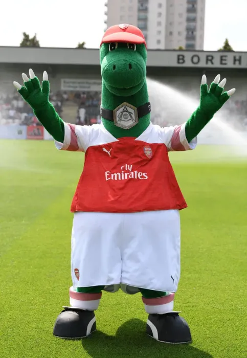 Framed Print : Gunnersaurus: Arsenal's Iconic Mascot at Borehamwood Pre-Season Friendly