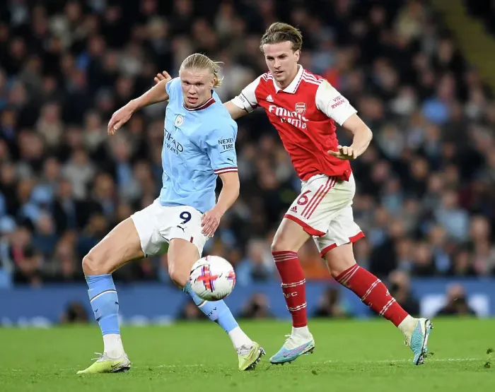 Framed Print : Haaland vs. Holding: Battle for Possession in Manchester City vs. Arsenal Premier League Clash (2022-23) Framed Print : Haaland vs. Holding: Battle for Possession in Manchester City vs. Arsenal Premier League Clash (2022-23)