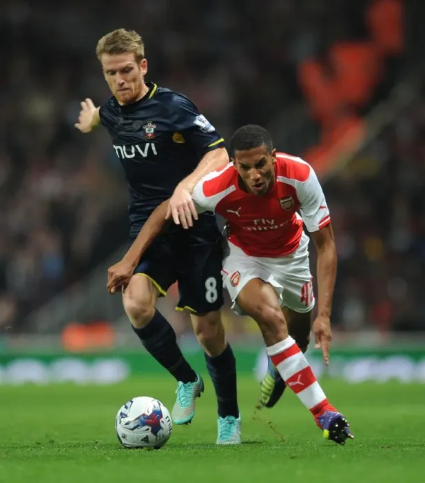 Framed Print : Hayden vs. Davis: A Tense Battle - Arsenal vs. Southampton (League Cup 2014 / 15)