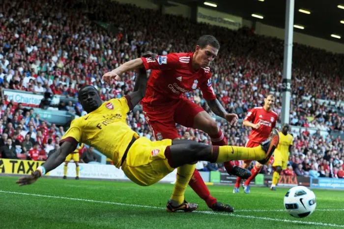Framed Print : Head-to-Head: Eboue vs. Agger in the Intense Liverpool vs. Arsenal Rivalry Framed Print : Head-to-Head: Eboue vs. Agger in the Intense Liverpool vs. Arsenal Rivalry