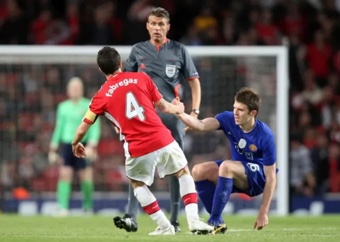 Framed Print : Heartbreak at the Emirates: Cesc Fabregas vs Michael Carrick in Arsenal's 3-1 Semi-Final Defeat to Manchester United in the UEFA Champions League Framed Print : Heartbreak at the Emirates: Cesc Fabregas vs Michael Carrick in Arsenal's 3-1 Semi-Final Defeat to Manchester United in the UEFA Champions League