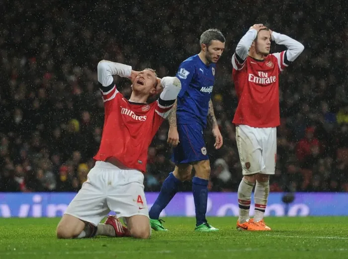 Framed Print : Heartbreaking Miss: Per Mertesacker's Agonizing Header at Arsenal vs. Cardiff City