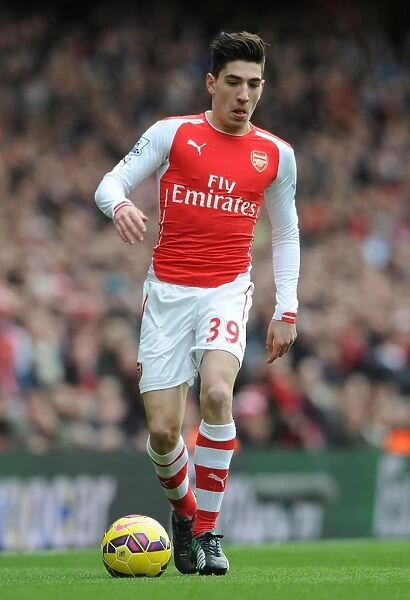 Hector Bellerin: Arsenal's Dynamic Defender in Action Against Stoke City, Premier League 2014-15