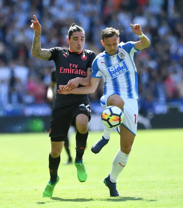 Framed Print : Hector Bellerin vs. Chris Lowe: A Premier League Battle at Huddersfield