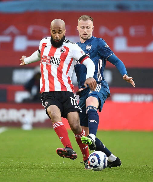 Holding Down Sheffield United: Arsenal's Rob Holding in Action Against David McGoldrick (April 2021)