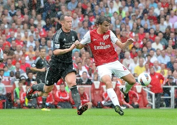 Ignasi Miquel (Arsenal) Charlie Adam (Liverpool). Arsenal 0:2 Liverpool