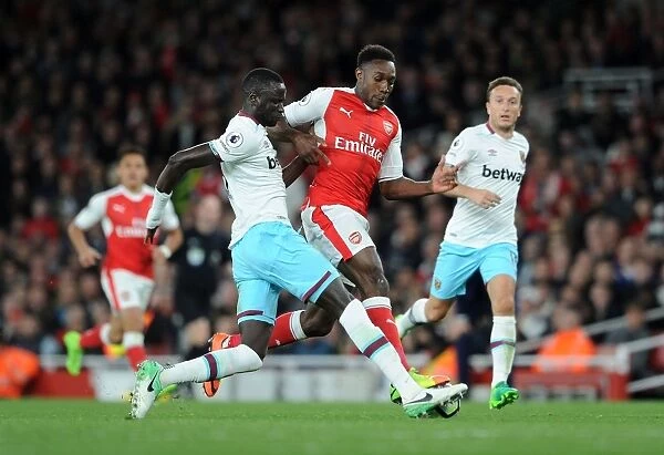Intense Battle: Danny Welbeck vs. Cheikhou Kouyate - Arsenal vs. West Ham Premier League Clash