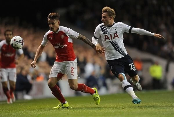 Intense Battle: Debuchy vs. Eriksen in the Capital One Cup Clash Between Tottenham and Arsenal