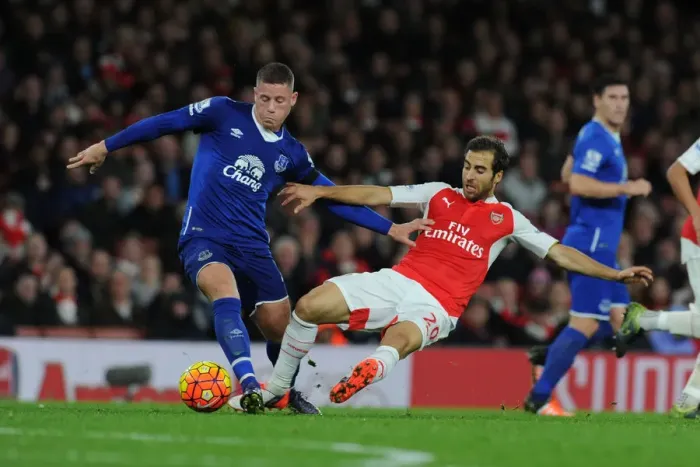 Framed Print : Intense Battle: Flamini Tackles Barkley in Arsenal vs. Everton Premier League Clash