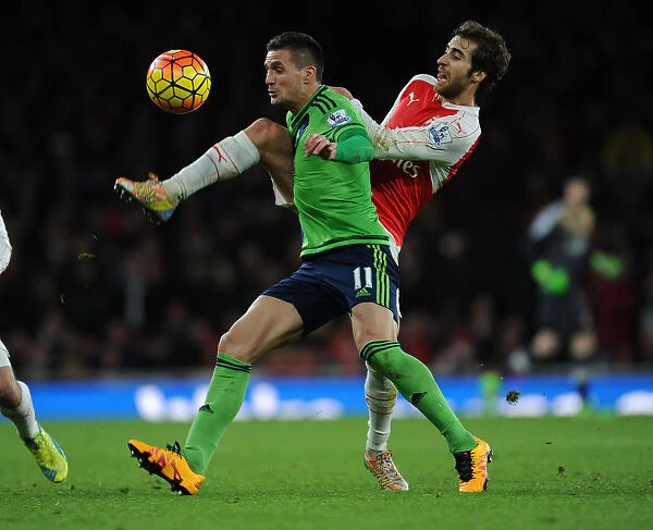 Intense Battle: Flamini vs Tadic - Arsenal vs Southampton Rivalry