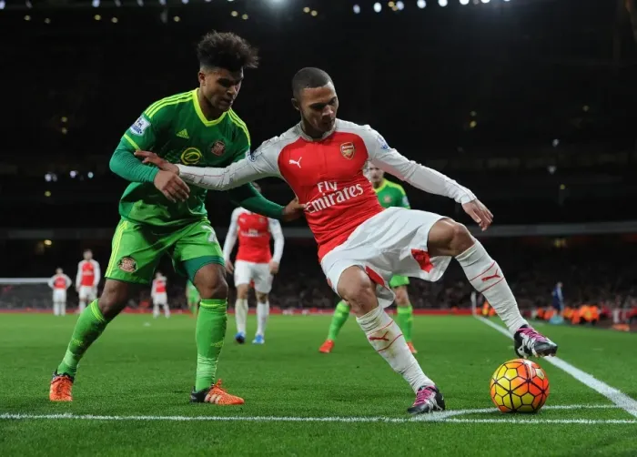 Framed Print : Intense Battle: Kieran Gibbs vs. DeAndre Yedlin in Arsenal vs. Sunderland Clash