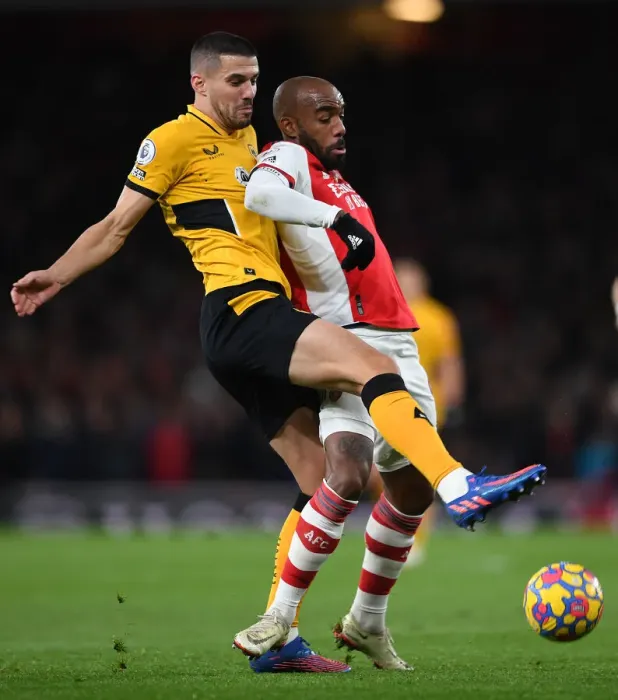 Framed Print : Intense Battle: Lacazette vs. Coady - Arsenal vs. Wolverhampton Wanderers Premier League Clash Framed Print : Intense Battle: Lacazette vs. Coady - Arsenal vs. Wolverhampton Wanderers Premier League Clash