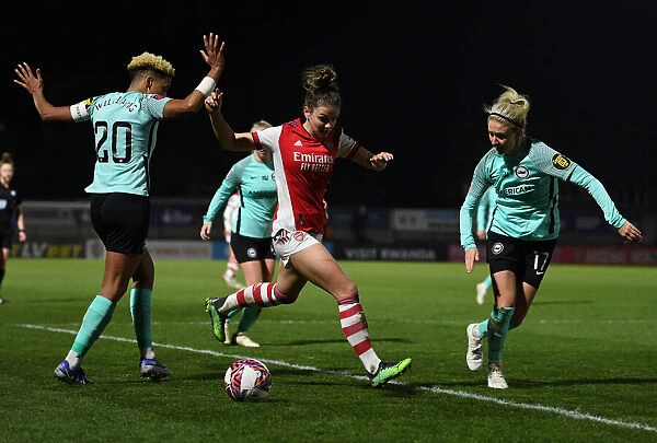 Intense Battle: Laura Wienroither of Arsenal vs Brighton's Defense at Meadow Park, FA WSL