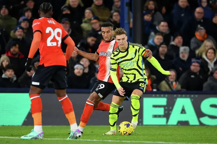 Framed Print : Intense Battle: Martin Odegaard Faces Off Against Jacob Brown in Luton Town vs Arsenal FC, Premier League 2023-24 Framed Print : Intense Battle: Martin Odegaard Faces Off Against Jacob Brown in Luton Town vs Arsenal FC, Premier League 2023-24