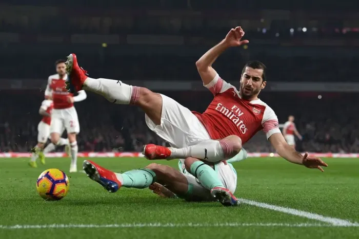 Framed Print : Intense Battle: Mkhitaryan vs. Smith in Arsenal's Premier League Clash against Bournemouth Framed Print : Intense Battle: Mkhitaryan vs. Smith in Arsenal's Premier League Clash against Bournemouth