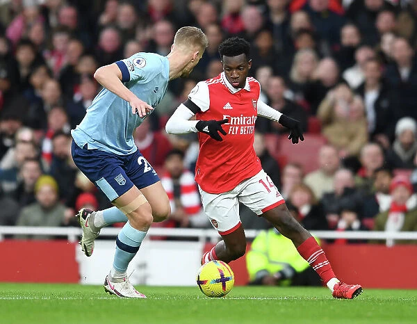 Intense Battle: Nketiah vs. Ajer in Arsenal's Premier League Clash Against Brentford