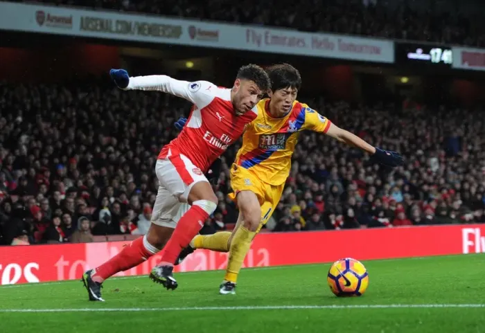 Framed Print : Intense Battle: Oxlade-Chamberlain vs. Lee - Arsenal vs. Crystal Palace Rivalry Framed Print : Intense Battle: Oxlade-Chamberlain vs. Lee - Arsenal vs. Crystal Palace Rivalry