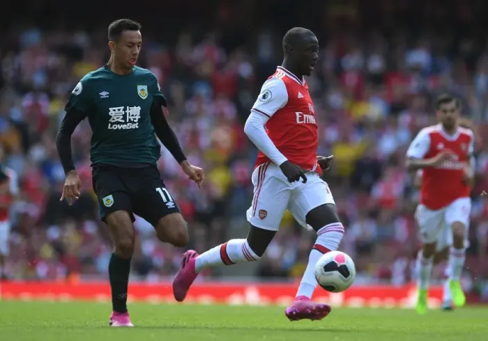 Framed Print : Intense Battle: Pepe vs. McNeil, Arsenal vs. Burnley, Premier League 2019-20 Framed Print : Intense Battle: Pepe vs. McNeil, Arsenal vs. Burnley, Premier League 2019-20