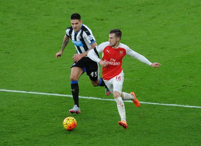 Framed Print : Intense Battle: Ramsey vs Mitrovic - A Premier League Showdown
