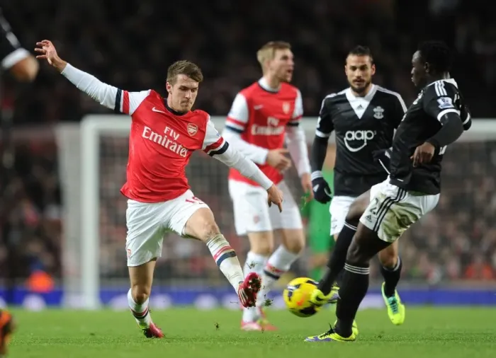 Framed Print : Intense Battle: Ramsey vs. Wanyama - Arsenal vs. Southampton, Premier League 2013-14