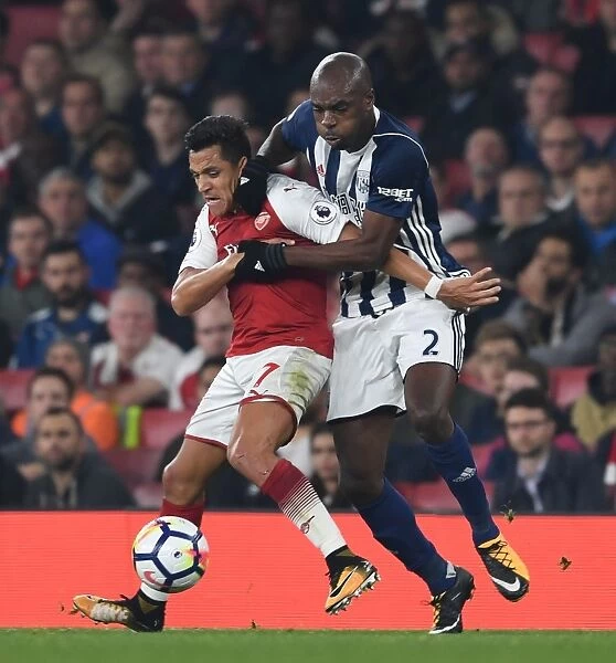 Intense Battle: Sanchez vs. Nyom in Arsenal's Premier League Clash