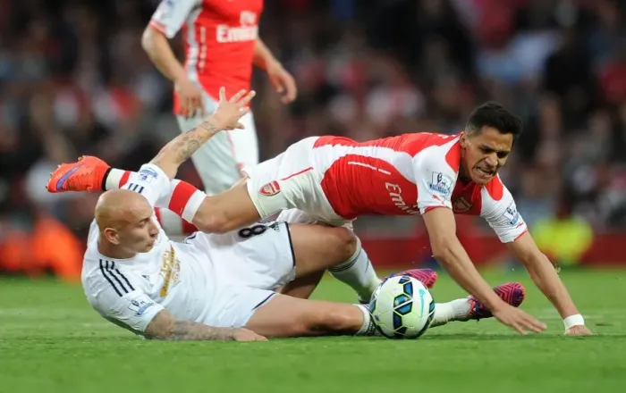 Framed Print : Intense Clash at Emirates: Sanchez Fouls Shelvey, Premier League 2014 / 15 Framed Print : Intense Clash at Emirates: Sanchez Fouls Shelvey, Premier League 2014 / 15