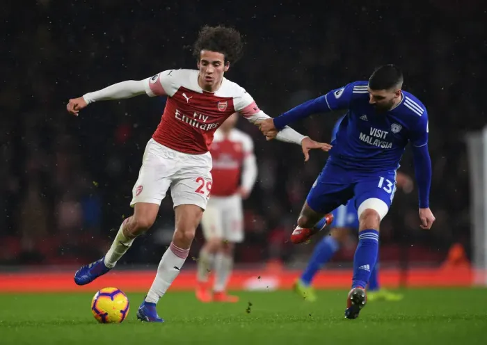 Framed Print : Intense Clash: Guendouzi vs. Paterson in Arsenal's Premier League Battle Framed Print : Intense Clash: Guendouzi vs. Paterson in Arsenal's Premier League Battle