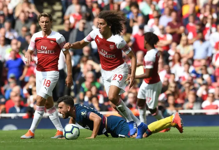 Framed Print : Intense Clash: Guendouzi vs. Snodgrass in Premier League Showdown