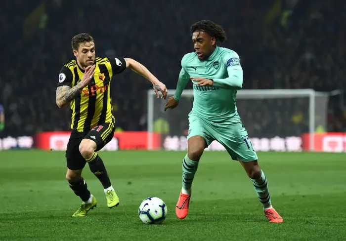 Framed Print : Intense Clash: Iwobi vs. Femenia in Premier League Showdown Framed Print : Intense Clash: Iwobi vs. Femenia in Premier League Showdown