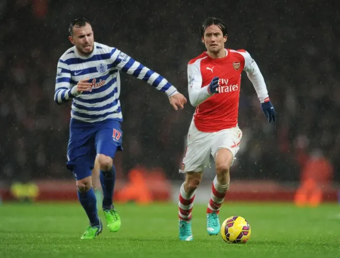 Framed Print : Intense Clash: Rosicky vs. Mutch in Premier League Battle