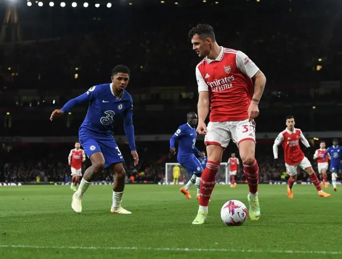 Framed Print : Intense Clash: Xhaka vs. Chelsea - Arsenal's Premier League Battle (2022-23) Framed Print : Intense Clash: Xhaka vs. Chelsea - Arsenal's Premier League Battle (2022-23)