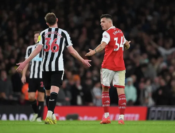 Framed Print : Intense Conversation: Xhaka and Longstaff Deep in Thought during Arsenal vs. Newcastle Clash (2022-23) Framed Print : Intense Conversation: Xhaka and Longstaff Deep in Thought during Arsenal vs. Newcastle Clash (2022-23)