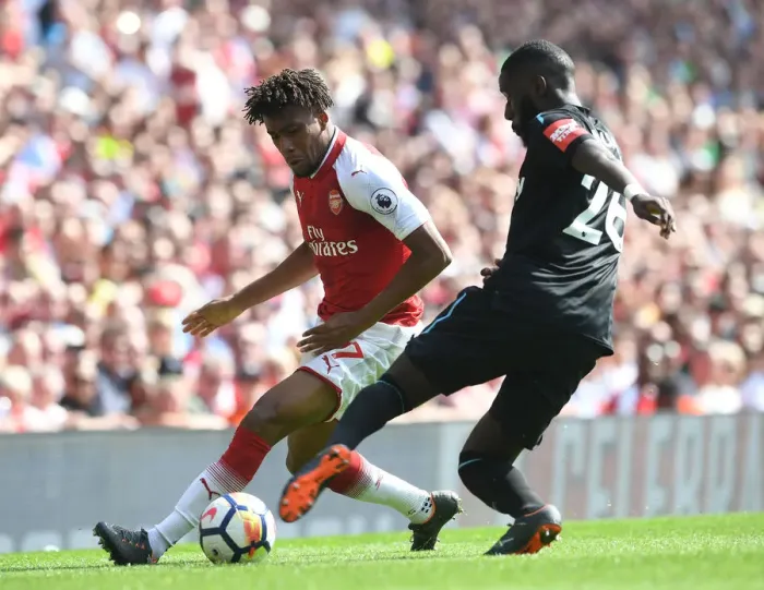 Framed Print : Intense Face-Off: Iwobi vs. Masuaku in Arsenal vs. West Ham Clash