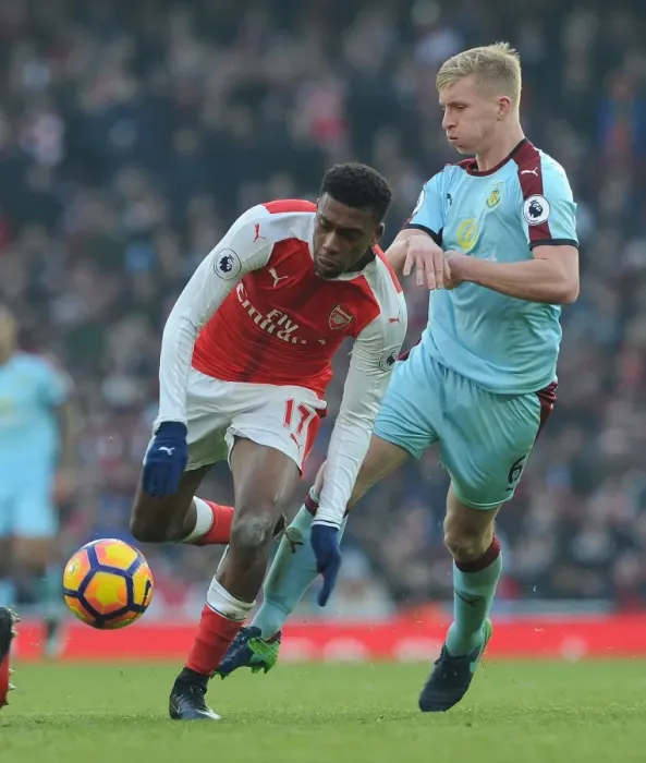 Framed Print : Intense Face-Off: Iwobi vs Mee - Arsenal's Battle Against Burnley Framed Print : Intense Face-Off: Iwobi vs Mee - Arsenal's Battle Against Burnley