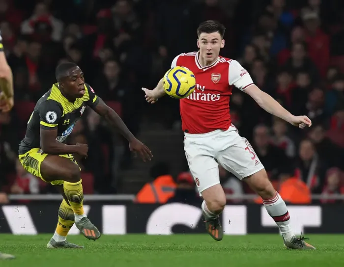 Framed Print : Intense Face-off: Kieran Tierney vs. Michael Obafemi in Arsenal's Battle against Southampton