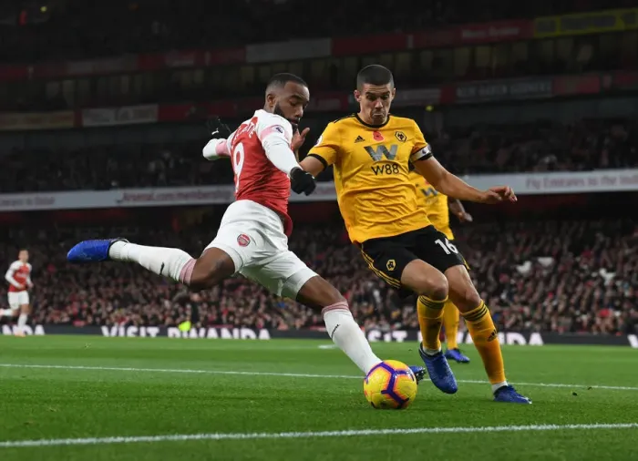 Framed Print : Intense Face-Off: Lacazette vs. Coady in Arsenal's Premier League Battle Framed Print : Intense Face-Off: Lacazette vs. Coady in Arsenal's Premier League Battle