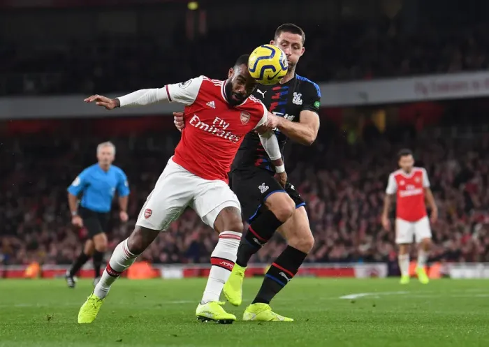 Framed Print : Intense Face-off: Lacazette vs. Cahill - Arsenal vs. Crystal Palace Premier League Clash Framed Print : Intense Face-off: Lacazette vs. Cahill - Arsenal vs. Crystal Palace Premier League Clash