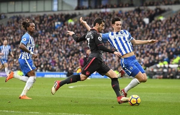 Intense Face-Off: Mkhitaryan vs. Dunk in Premier League Clash between Arsenal and Brighton