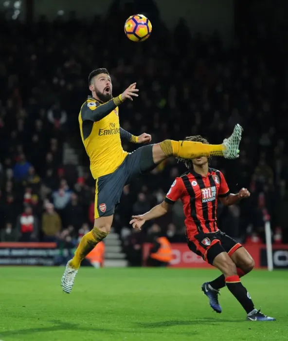 Framed Print : Intense Face-Off: Olivier Giroud vs. Nathan Ake - Premier League Showdown between Arsenal and Bournemouth Framed Print : Intense Face-Off: Olivier Giroud vs. Nathan Ake - Premier League Showdown between Arsenal and Bournemouth