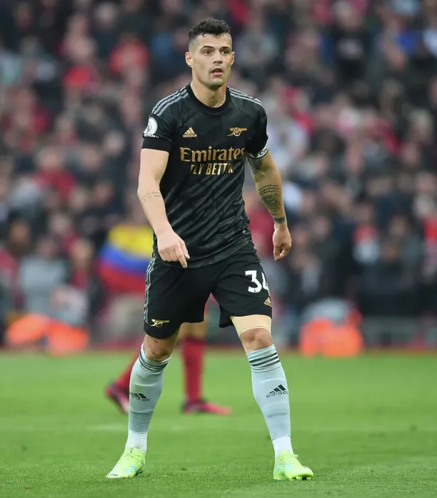 Framed Print : Intense Midfield Battle: Granit Xhaka Fights It Out Against Liverpool in the Premier League 2022-23