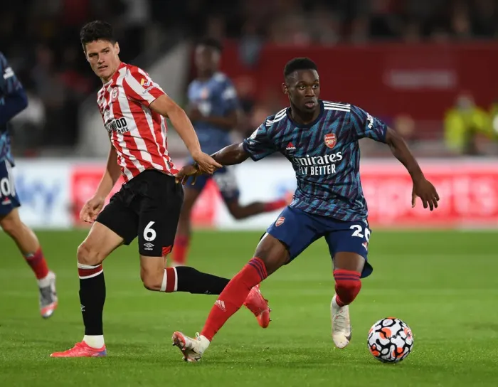 Framed Print : Intense Premier League Clash: Flo Balogun vs Christian Norgaard - Arsenal's Battle at Brentford Community Stadium (2021-22) Framed Print : Intense Premier League Clash: Flo Balogun vs Christian Norgaard - Arsenal's Battle at Brentford Community Stadium (2021-22)