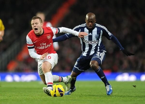 Intense Premier League Clash: Jack Wilshere Fouls Youssouf Mulumbu (Arsenal vs. West Bromwich Albion, 2012-13)