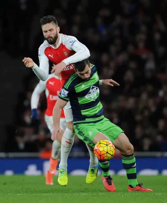 Framed Print : Intense Premier League Clash: Olivier Giroud Fouls by Jack Cork (Arsenal vs Swansea, 2015-16) Framed Print : Intense Premier League Clash: Olivier Giroud Fouls by Jack Cork (Arsenal vs Swansea, 2015-16)