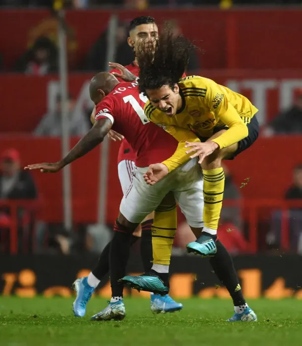 Framed Print : Intense Premier League Rivalry: Guendouzi Fouls Young - Manchester United vs. Arsenal (2019-20)