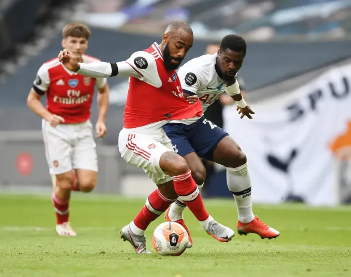 Framed Print : Intense Premier League Rivalry: Lacazette Fouls Aurier (Tottenham vs Arsenal, 2019-20)