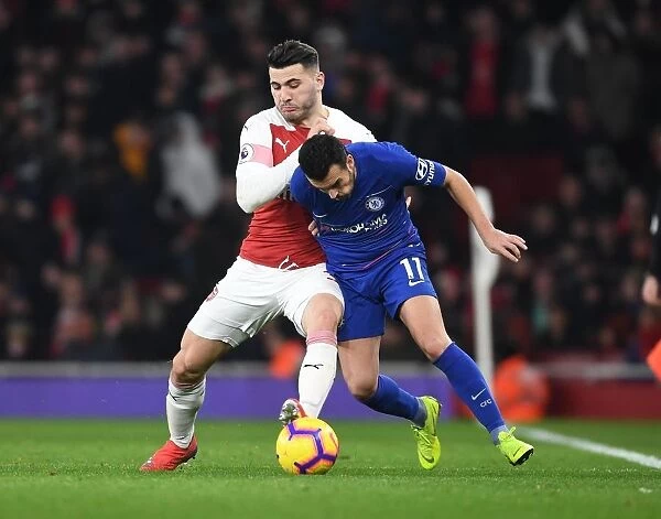 Intense Rivalry: Arsenal vs. Chelsea Clash in the Premier League - Sead Kolasinac vs. Pedro
