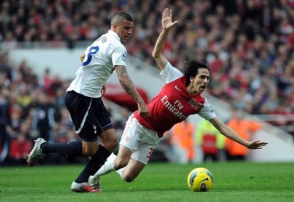 Intense Rivalry: Arsenal vs. Tottenham Clash in the Premier League (2011-12) - Yossi Benayoun vs. Kyle Walker