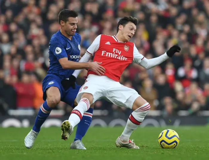 Framed Print : Intense Rivalry: Azpilicueta Fouls Ozil - Arsenal vs. Chelsea (2019-20) Framed Print : Intense Rivalry: Azpilicueta Fouls Ozil - Arsenal vs. Chelsea (2019-20)